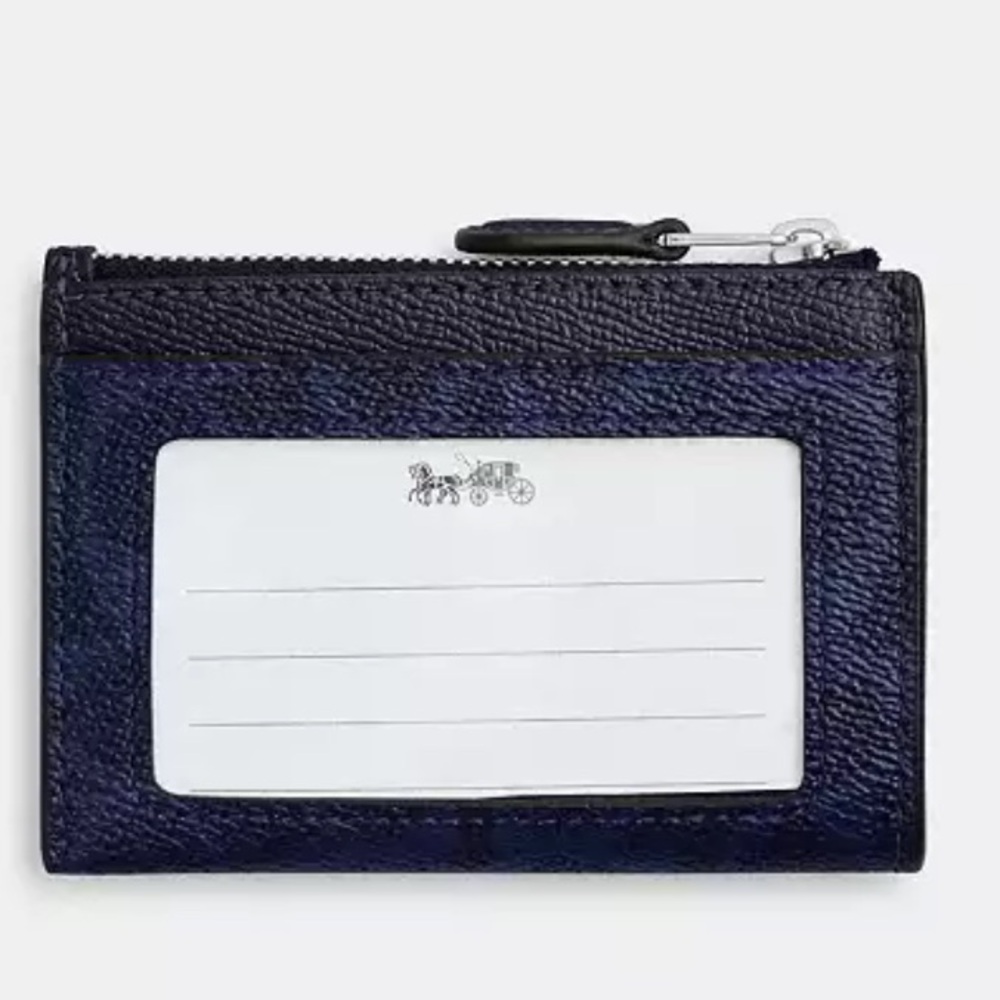 Coach Mini Skinny Id Case
In Signature Canvas NWT in packaging - Picture 2 of 4
